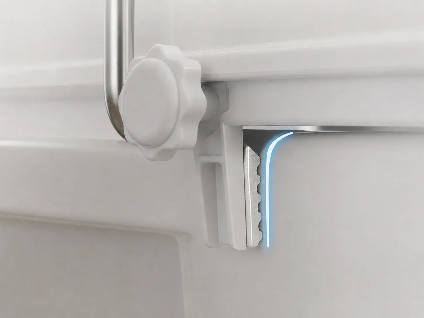 Close-up of the raised toilet seat's textured rubber locking clamp and hand-tightening knob gripping the toilet rim.